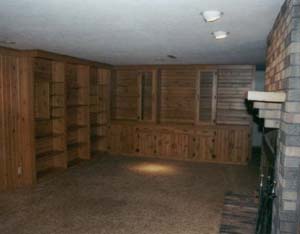 Lower level family room with many built-ins.